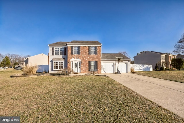 view of front of house featuring brick siding, a front lawn, concrete driveway, and a garage