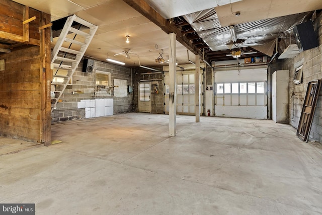 garage featuring concrete block wall