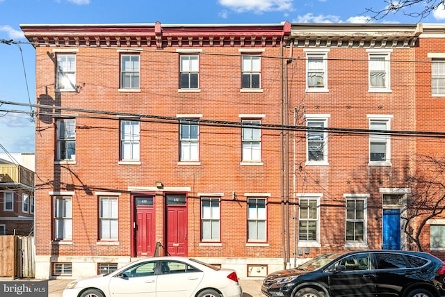 view of front of property featuring brick siding