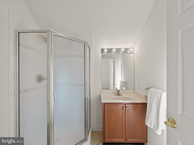 full bathroom with tile patterned floors, vanity, and a shower stall