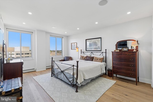 191 Presidential Blvd Unit R1018-1019, Bala Cynwyd, PA 19004 - bedroom with baseboard heating, light wood-style flooring, and recessed lighting