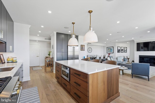 191 Presidential Blvd Unit R1018-1019, Bala Cynwyd, PA 19004 - kitchen featuring ornamental molding, stainless steel appliances, recessed lighting, light wood-style flooring, and light countertops