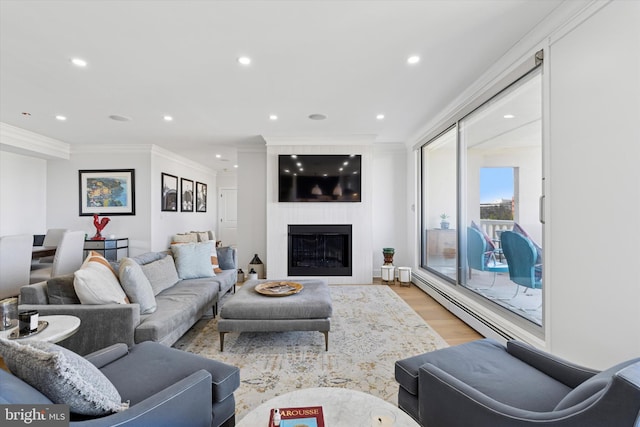 191 Presidential Blvd Unit R1018-1019, Bala Cynwyd, PA 19004 - living area with ornamental molding, light wood finished floors, recessed lighting, a large fireplace, and baseboard heating