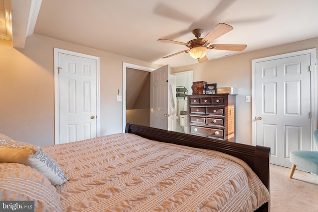 carpeted bedroom with ceiling fan