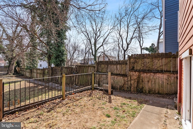 view of yard featuring a fenced backyard