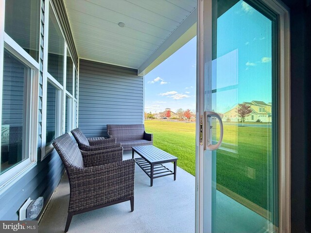 balcony featuring a porch