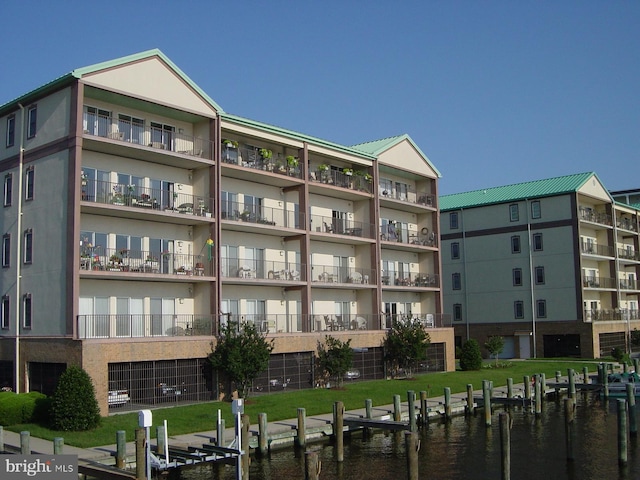 view of building exterior featuring a water view