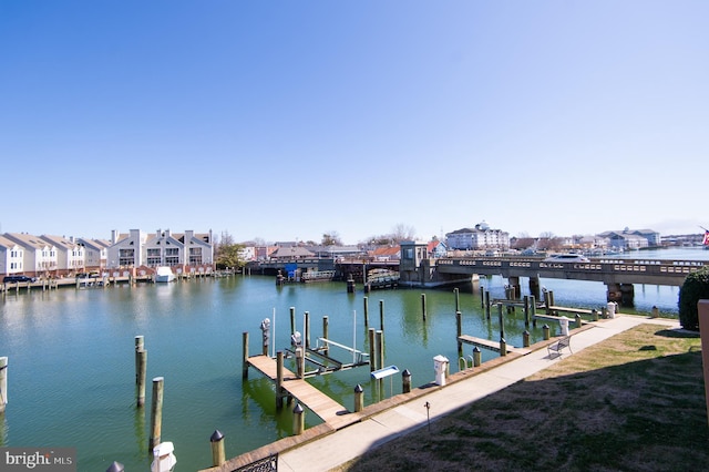 view of dock with a water view and boat lift