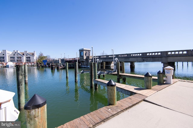 view of dock with a water view and boat lift