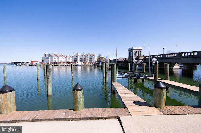 dock area featuring a water view and boat lift