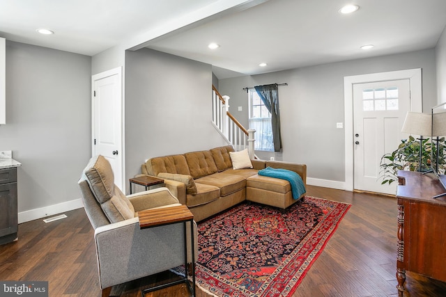 living area featuring recessed lighting, stairway, baseboards, and dark wood-style floors