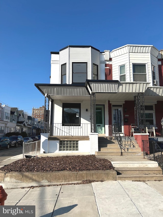 multi unit property featuring covered porch