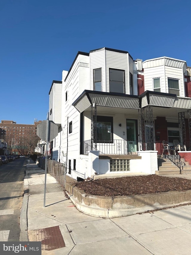 multi unit property featuring covered porch