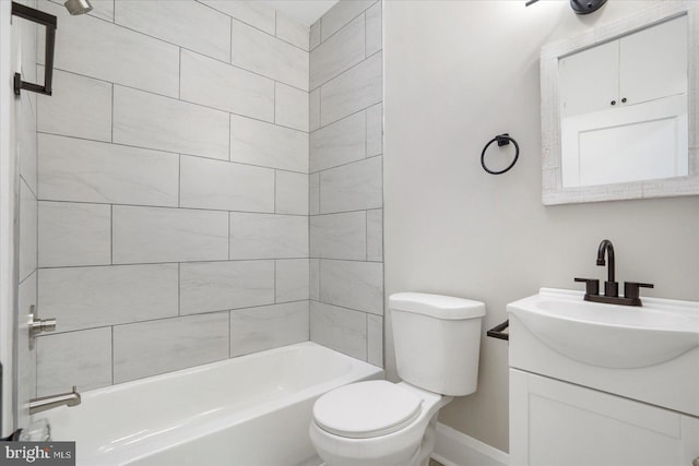 full bathroom featuring shower / bath combination, baseboards, toilet, and vanity