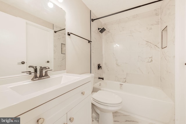 full bath with marble finish floor, toilet, vanity, and  shower combination