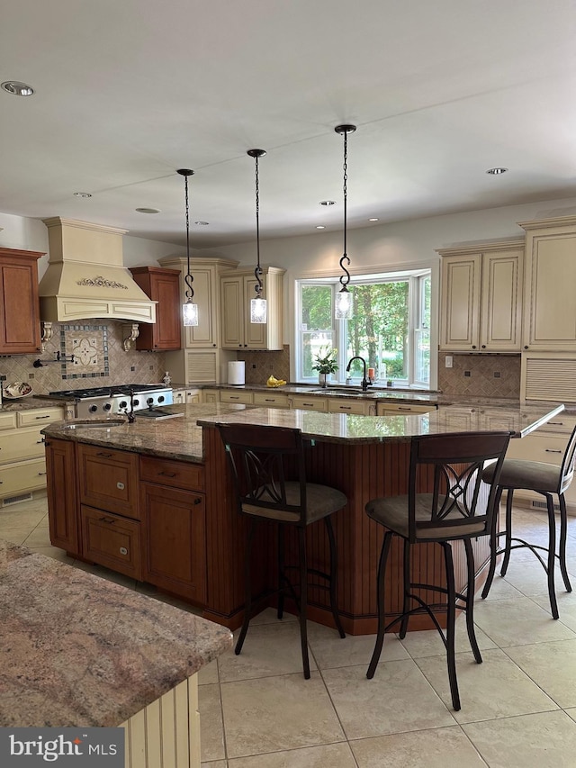 1800 Greer Ct, Gambrills, MD 21054 - kitchen featuring custom range hood, cream cabinetry, a large island, decorative backsplash, and recessed lighting