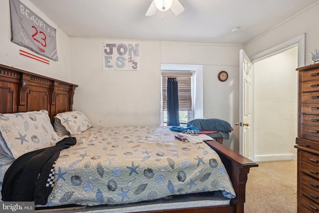 carpeted bedroom with a ceiling fan