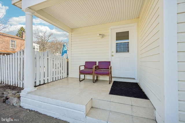 property entrance with fence