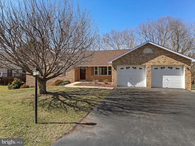 single story home featuring a front lawn, aphalt driveway, roof with shingles, a garage, and brick siding