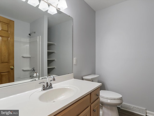 bathroom with visible vents, toilet, vanity, and shower / bath combination