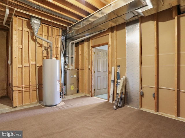 unfinished below grade area with heating unit and water heater