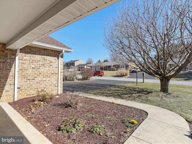 view of yard featuring a residential view