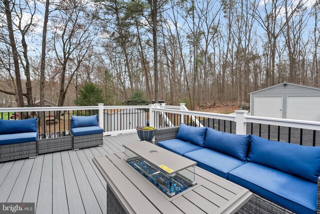 502 Dembytown Rd, Joppa, MD 21085 - wooden deck featuring a storage shed, an outbuilding, and an outdoor hangout area