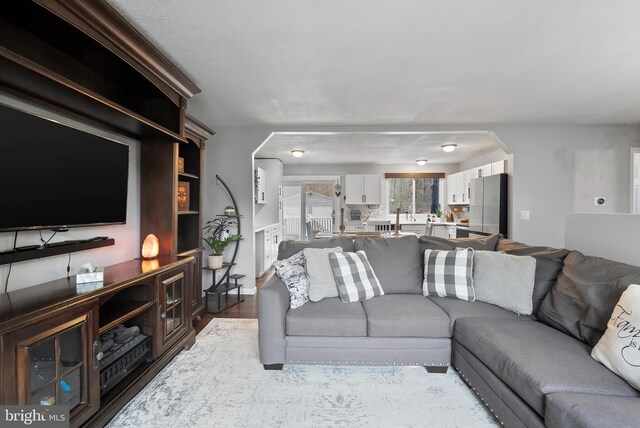 502 Dembytown Rd, Joppa, MD 21085 - living area with arched walkways and wood finished floors