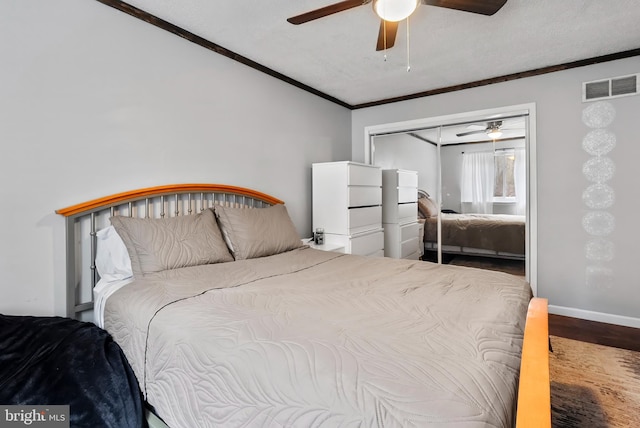 502 Dembytown Rd, Joppa, MD 21085 - bedroom featuring baseboards, ornamental molding, visible vents, ceiling fan, and wood finished floors