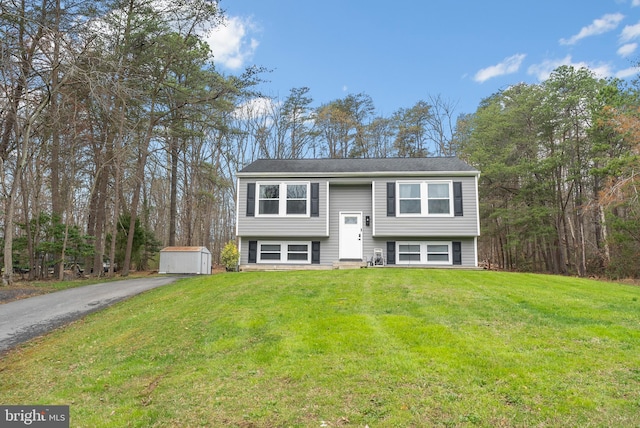 502 Dembytown Rd, Joppa, MD 21085 - raised ranch featuring a front yard, entry steps, a storage shed, an outbuilding, and driveway