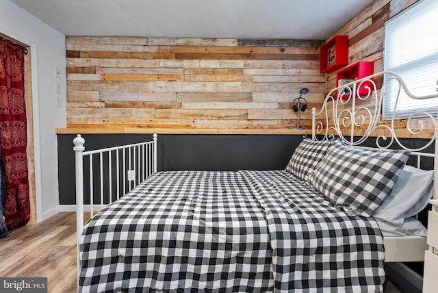 502 Dembytown Rd, Joppa, MD 21085 - unfurnished bedroom featuring light wood-style flooring and wooden walls