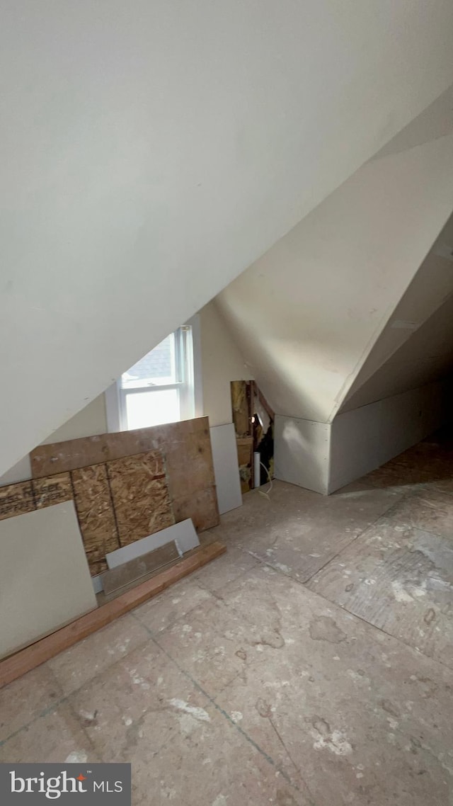 bonus room with vaulted ceiling