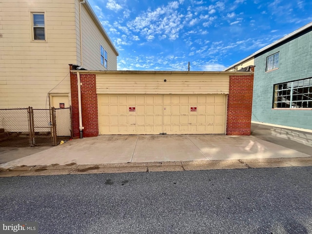 garage featuring fence