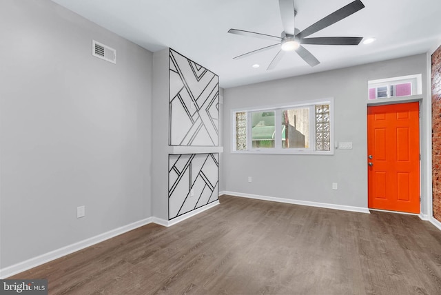 foyer entrance with recessed lighting, visible vents, baseboards, and wood finished floors