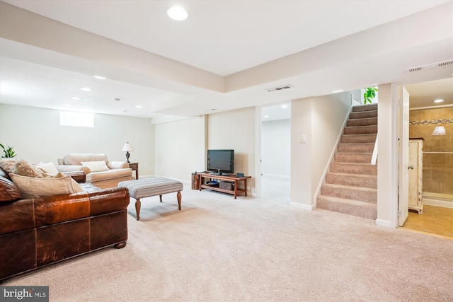 living area featuring stairway, recessed lighting, carpet, and visible vents