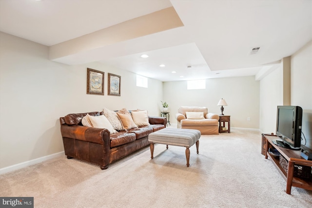 living area with recessed lighting, baseboards, and light colored carpet