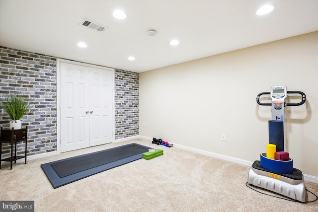 exercise room featuring recessed lighting, visible vents, and carpet