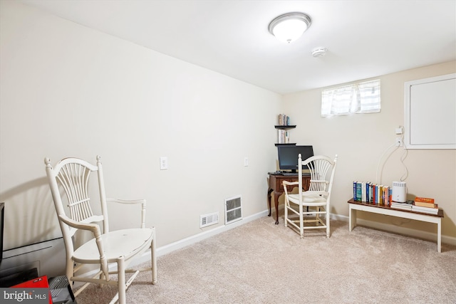 office space featuring visible vents, baseboards, and carpet