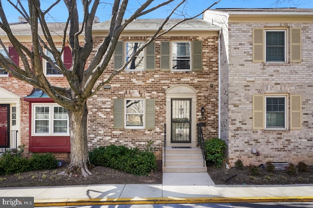 multi unit property featuring brick siding