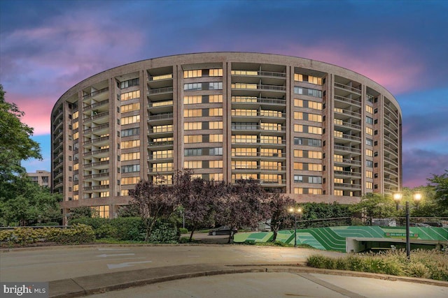 view of property at dusk