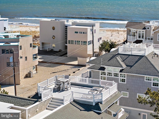 aerial view featuring a beach view and a water view