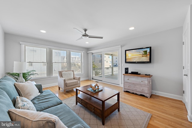 living room with recessed lighting, baseboards, light wood-type flooring, and ceiling fan