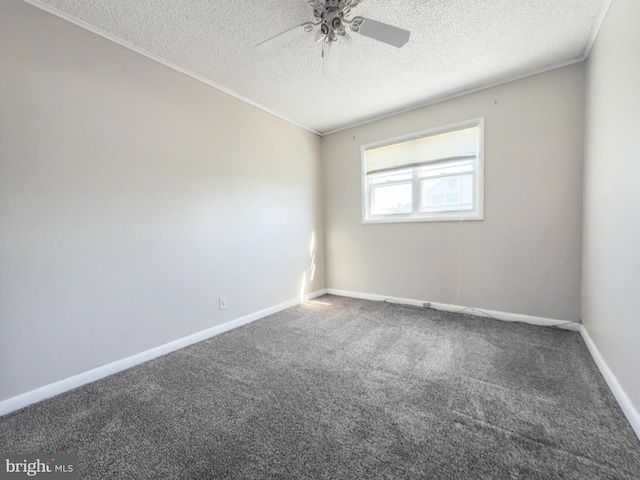 carpeted spare room with baseboards, a textured ceiling, a ceiling fan, and crown molding