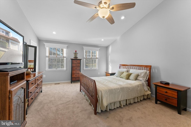 bedroom featuring ceiling fan, baseboards, light colored carpet, vaulted ceiling, and recessed lighting