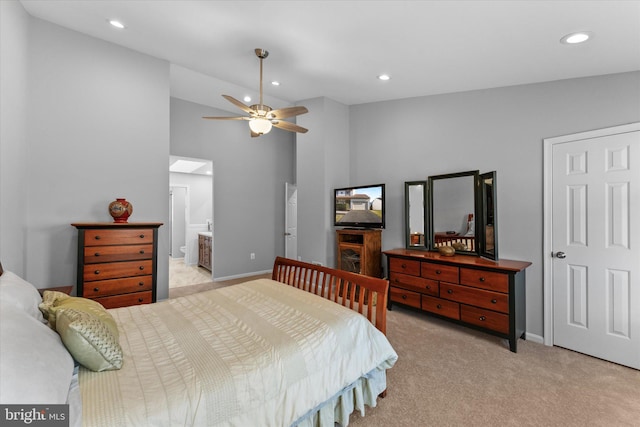 bedroom featuring recessed lighting, light colored carpet, and baseboards