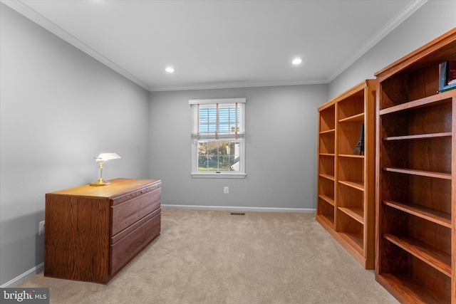 sitting room with visible vents, light colored carpet, baseboards, and ornamental molding