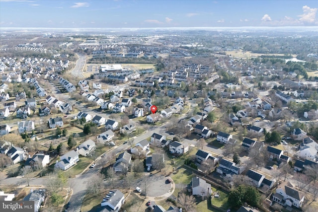 birds eye view of property with a residential view