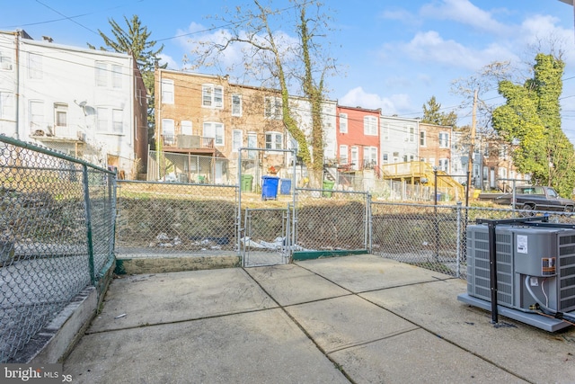 exterior space with a gate and fence