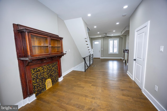 entryway with baseboards, ceiling fan, stairway, recessed lighting, and dark wood-style floors