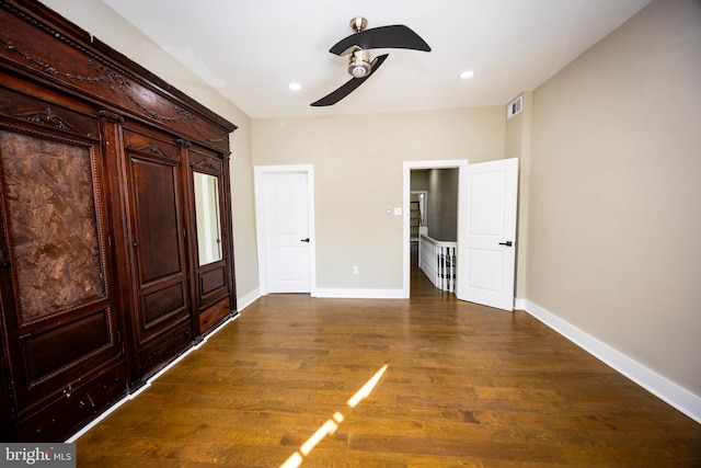 unfurnished bedroom featuring visible vents, recessed lighting, dark wood-type flooring, and baseboards